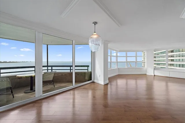 a kitchen with a sink a counter top stainless steel appliances and cabinets