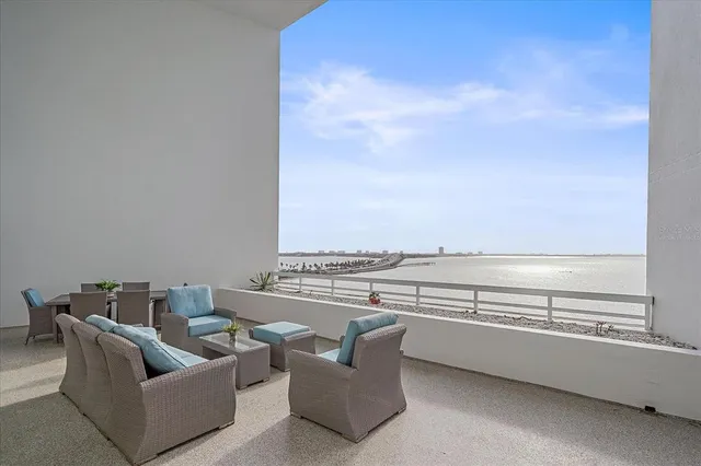 a view of ocean with a multi story building