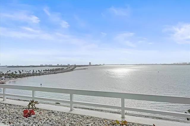 a view of swimming pool from a balcony