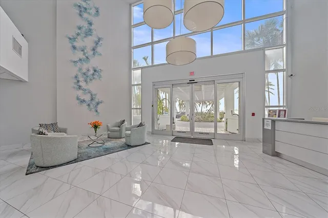 a view of livingroom with furniture and natural light