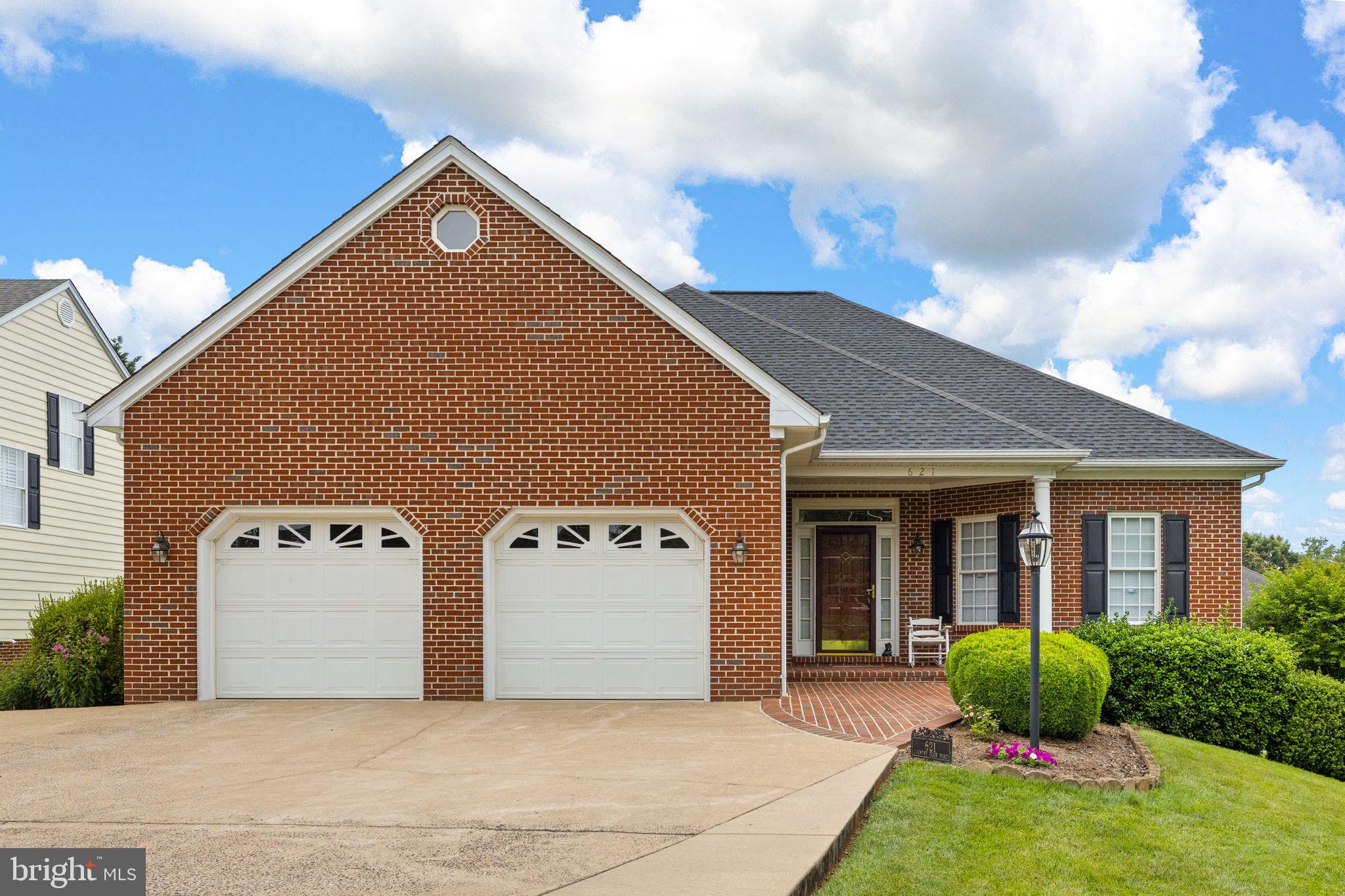 621 Country Club Road Culpeper, VA 22701 - Photo 2 of 45 Charming brick home with lush greenery.