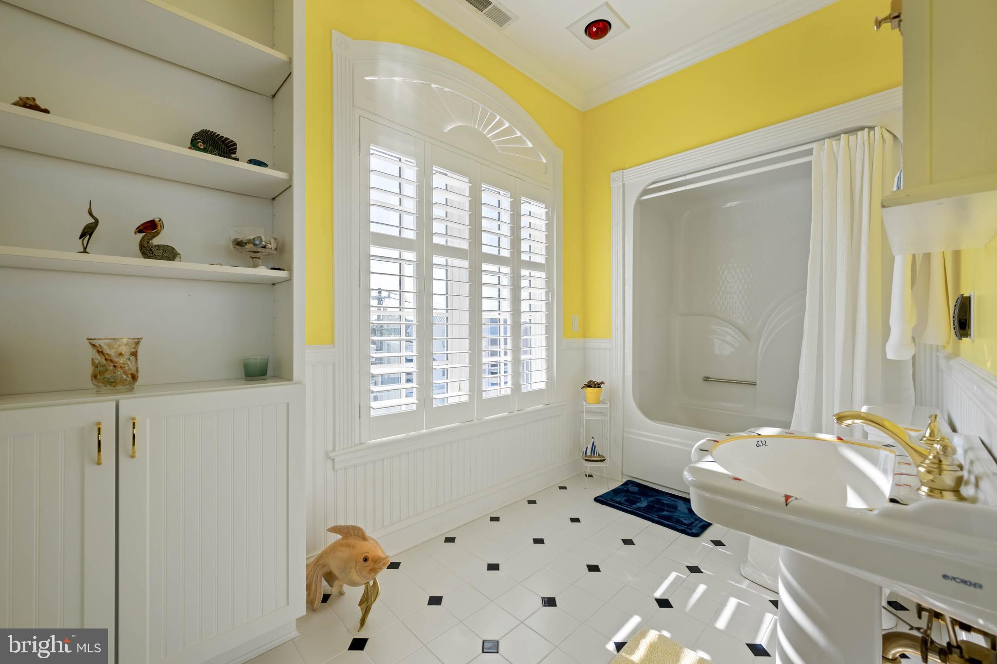 12959 Harbor Road Ocean City, MD 21842 - Photo 34 of 85 a bathroom with a sink toilet and shower