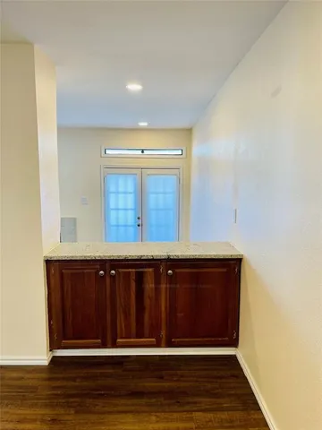 a view of kitchen with wooden floor