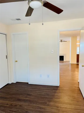 a view of a livingroom with wooden floor