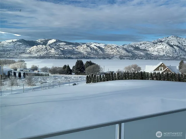 a view of a lake from a balcony