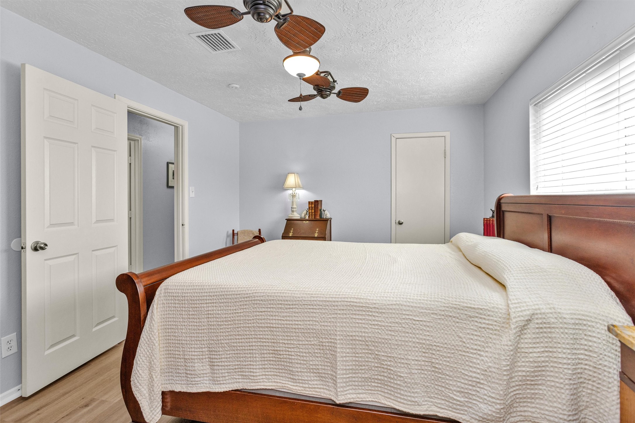 8422 Oakhaven Road La Porte, TX 77571 - Photo 22 of 46 Spacious primary bedroom with neutral tones and plenty of natural light.