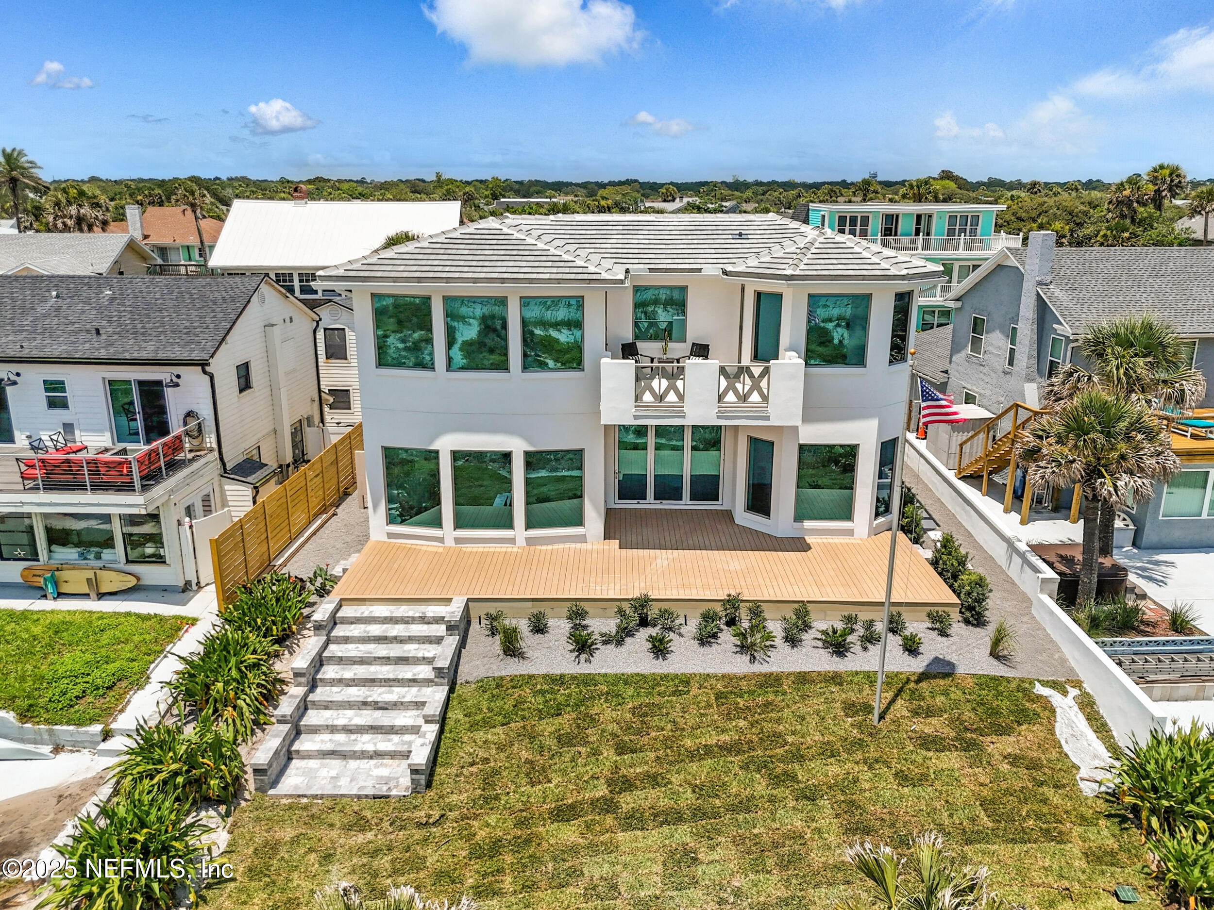1509 Ocean Front Neptune Beach, FL 32266 - Photo 57 of 93 a front view of a house with a yard