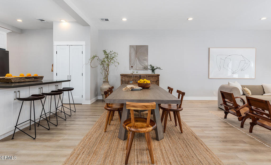 2040 North Madison Avenue Altadena, CA 91001 - Photo 5 of 35 a view of a dining room with furniture and wooden floor