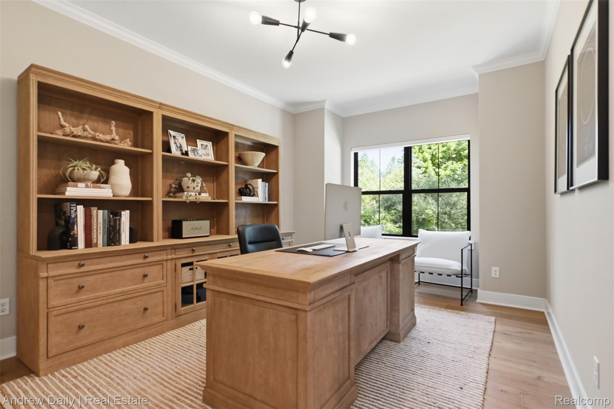 4661 Spears Road Pinckney, MI 48169 - Photo 10 of 56 Dedicated room featuring a built-in wood-finish bookshelf unit with drawers and open shelving