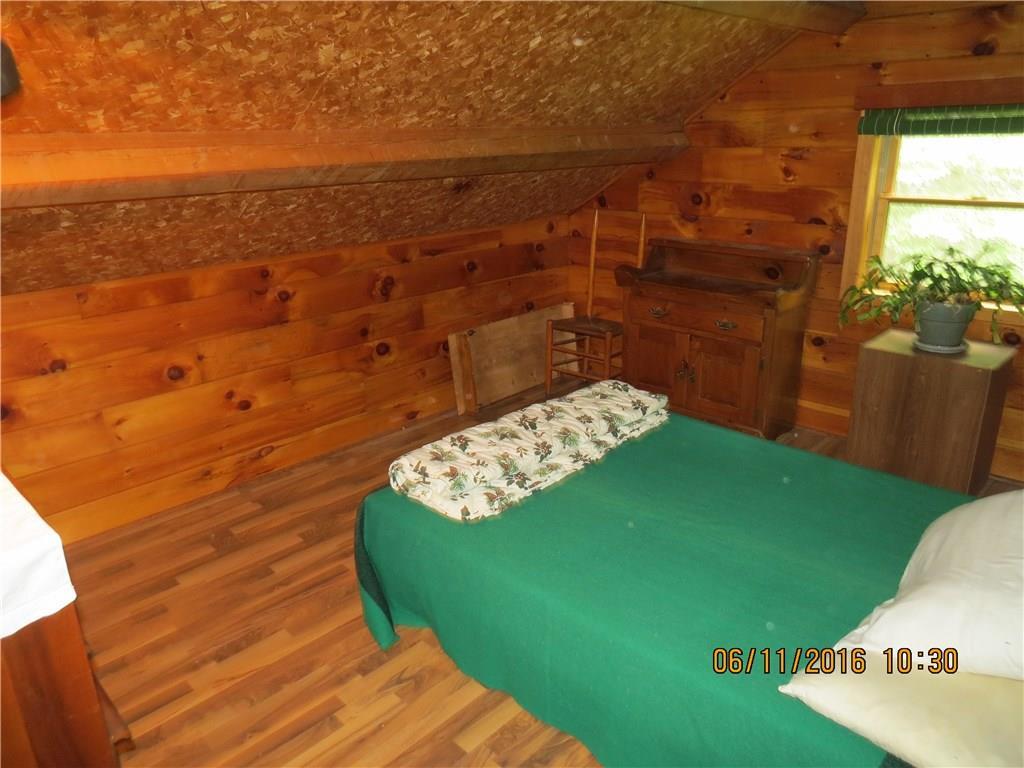 549 Strip Road Wallagrass, ME 04781 - Photo 26 of 31 1 of 2 Second Floor Bedrooms