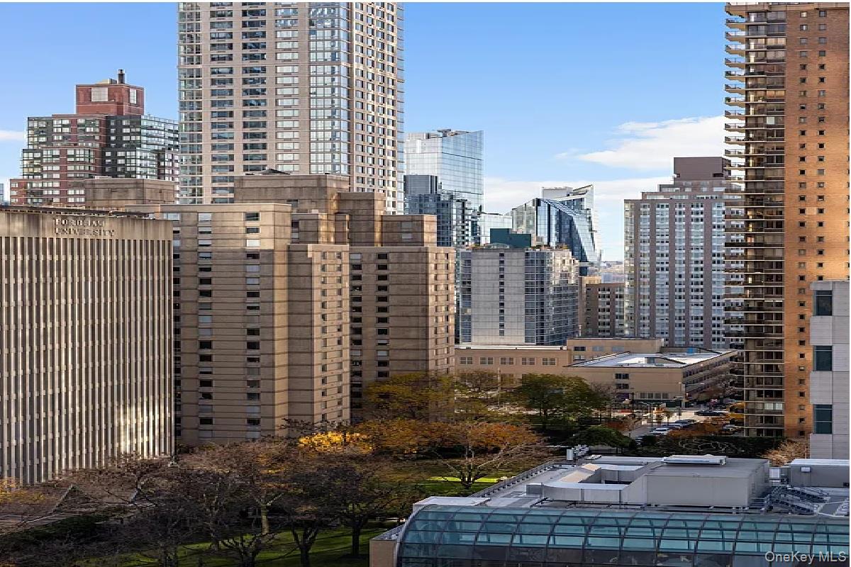 43 West 61st Street, Unit 12F Manhattan, NY 10023 - Photo 11 of 14 a city view with tall buildings