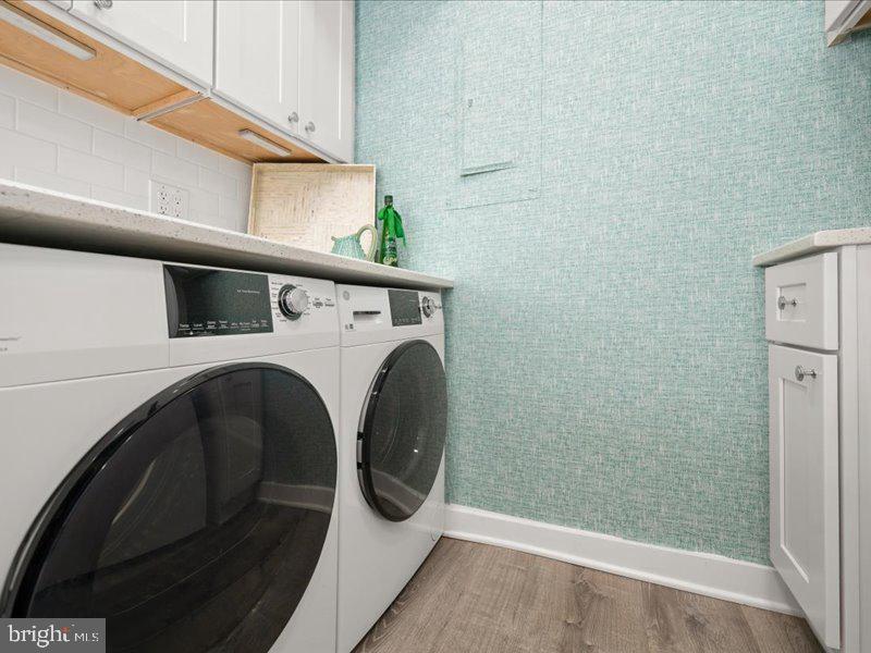 409 Annapolis House Road, Unit 409N Bethany Beach, DE 19930 - Photo 14 of 75 a utility room with dryer and washer