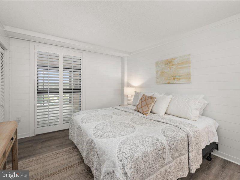 409 Annapolis House Road, Unit 409N Bethany Beach, DE 19930 - Photo 20 of 75 a bedroom with a bed and a window