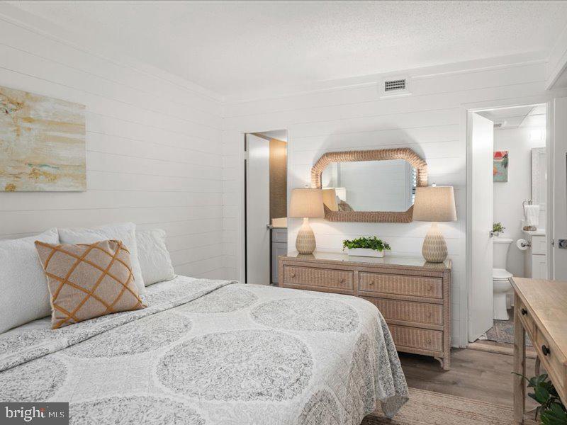 409 Annapolis House Road, Unit 409N Bethany Beach, DE 19930 - Photo 23 of 75 a bedroom with a bed and a couch