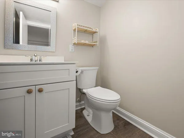 a balcony with table and chairs