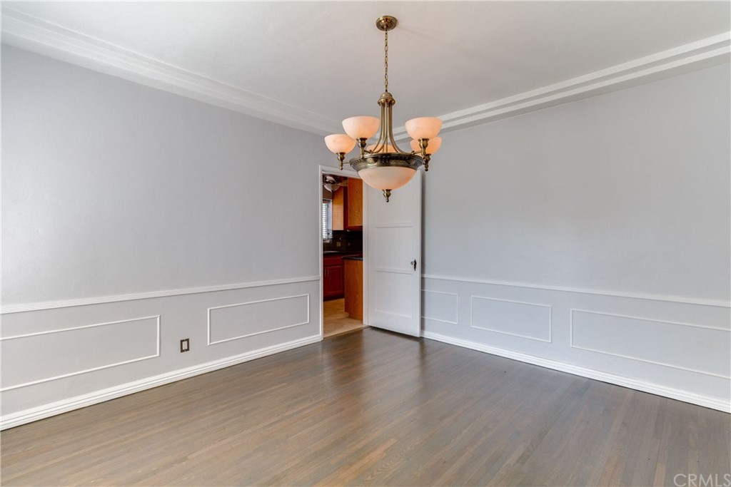 1763 Stearns Drive Los Angeles, CA 90035 - Photo 11 of 33 a view of a room with wooden floor closet and windows