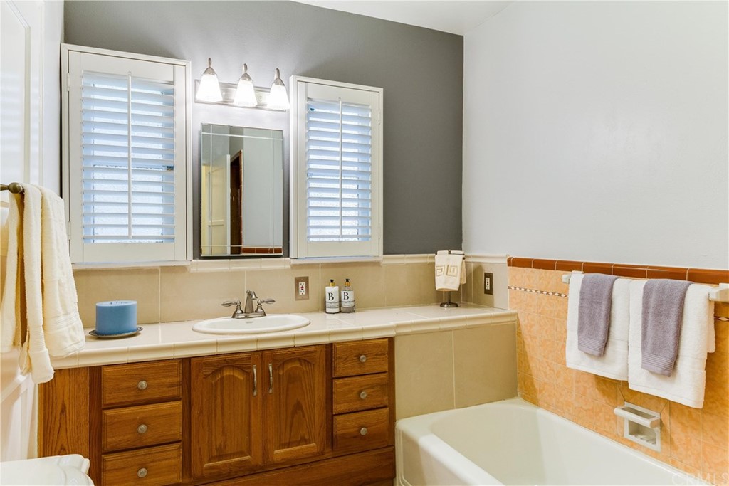 1763 Stearns Drive Los Angeles, CA 90035 - Photo 21 of 33 a bathroom with a sink and a bathtub