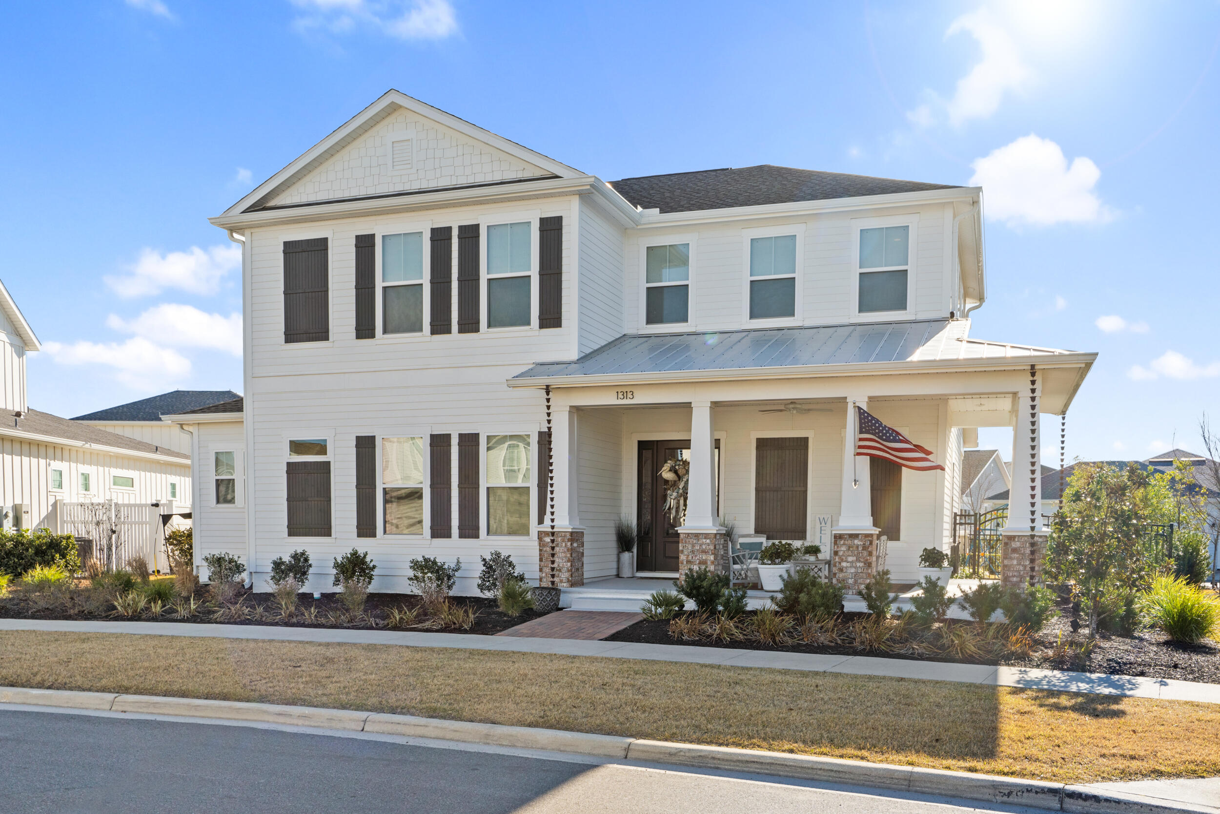 front view of a house with a yard