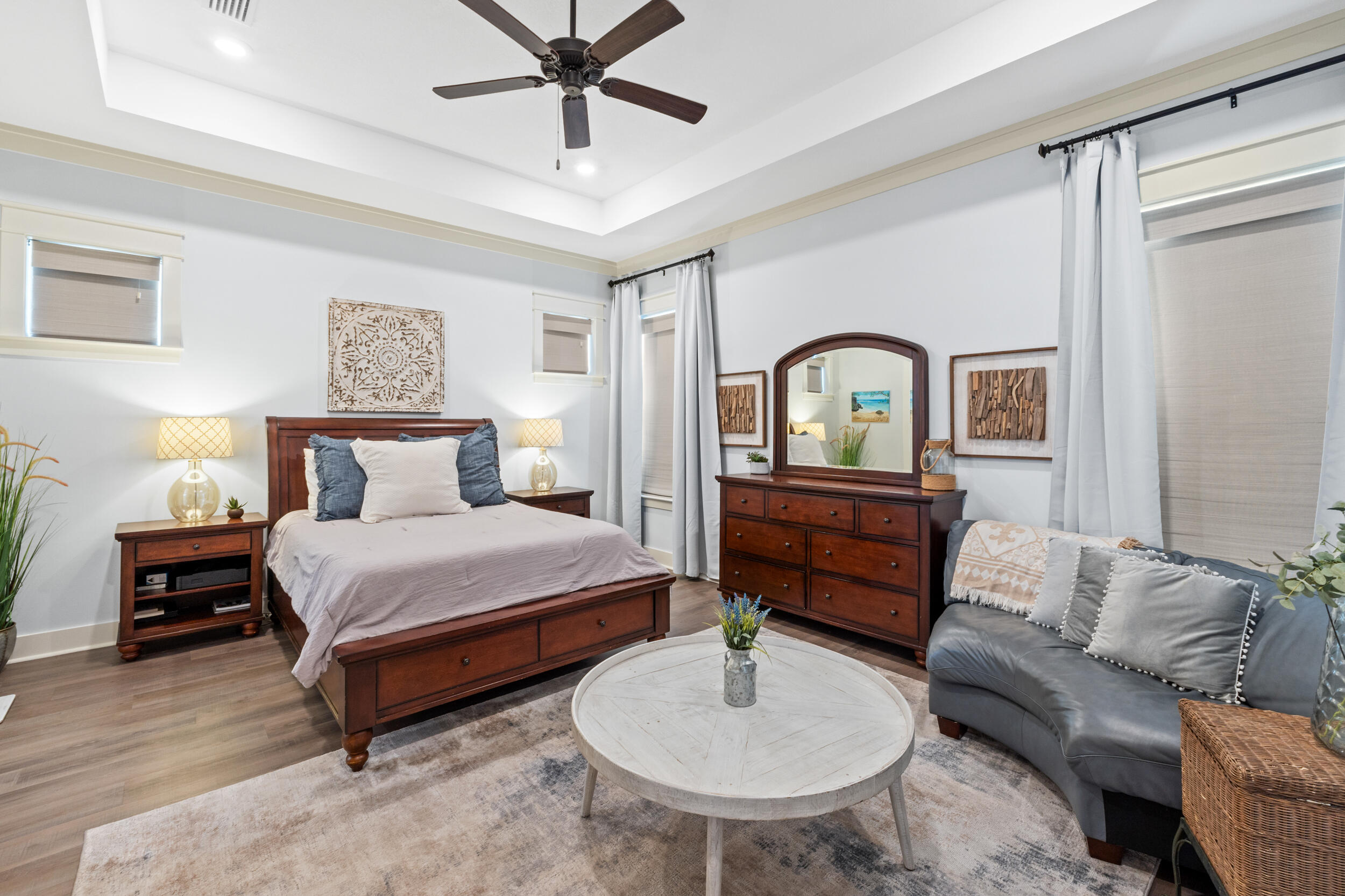 1313 North Discovery Loop Panama City, FL 32405 - Photo 13 of 50 a bedroom with a bed and a chandelier