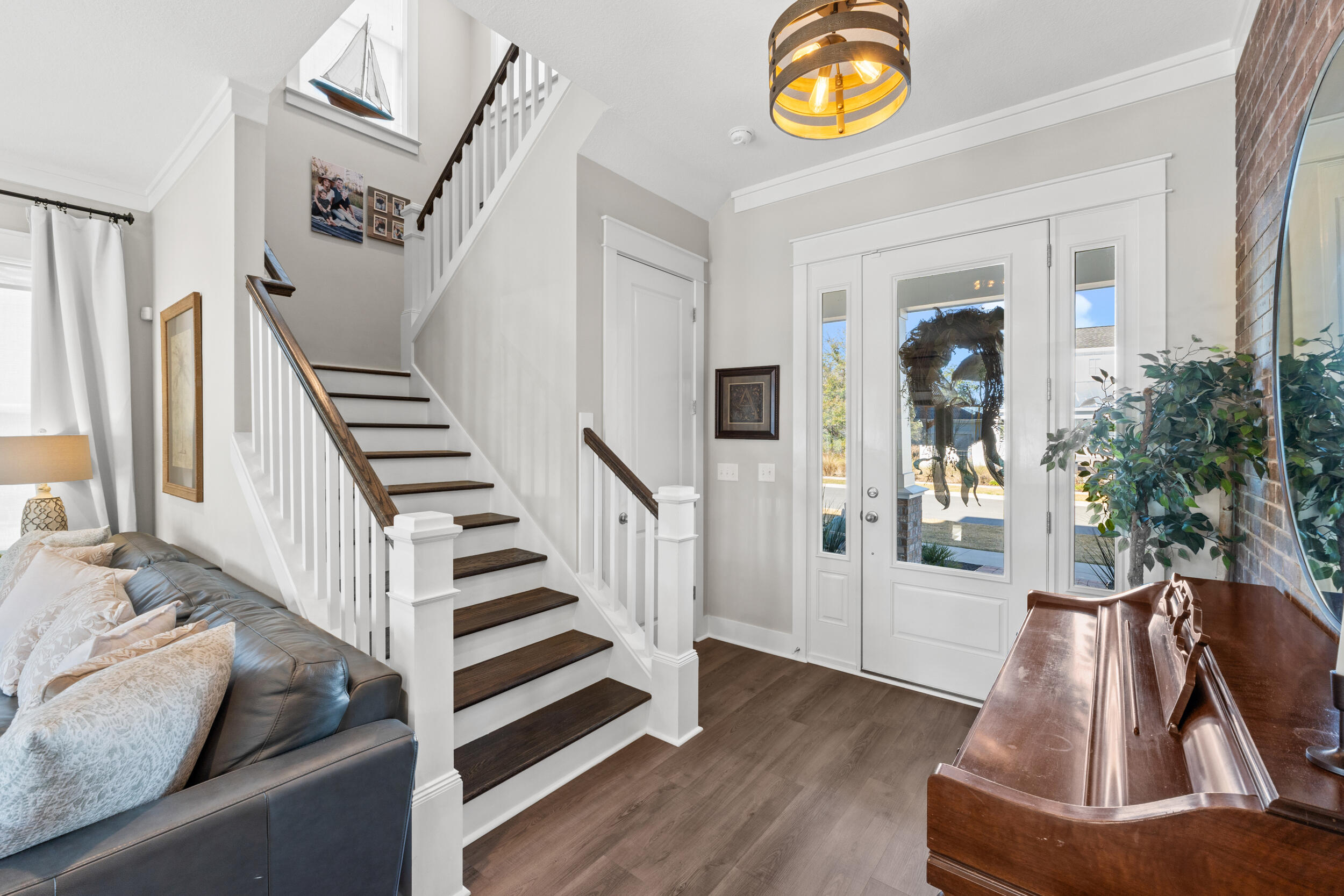1313 North Discovery Loop Panama City, FL 32405 - Photo 19 of 50 a view of an entryway with wooden floor and door
