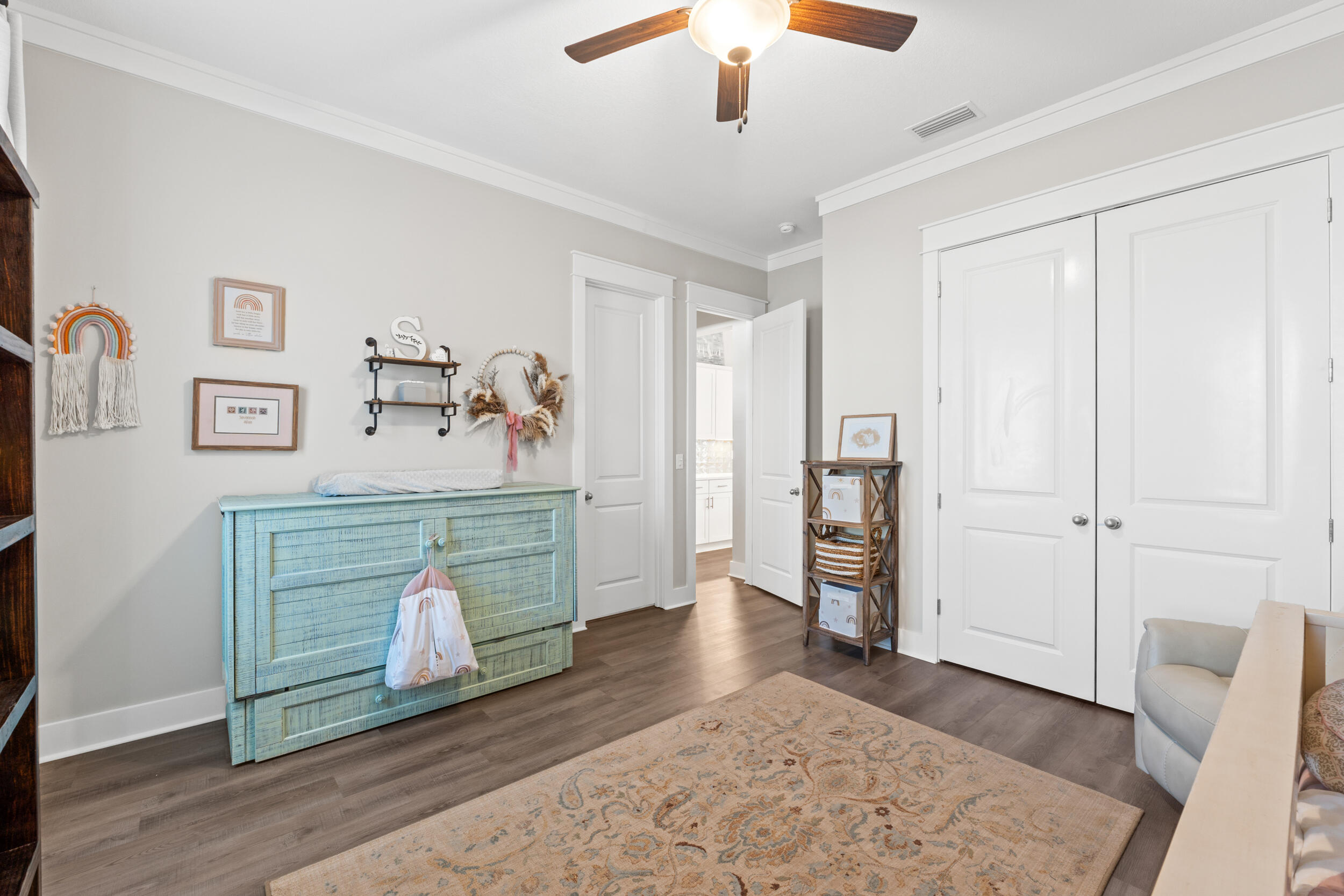 1313 North Discovery Loop Panama City, FL 32405 - Photo 22 of 50 an entryway at livingroom with furniture and wooden floor