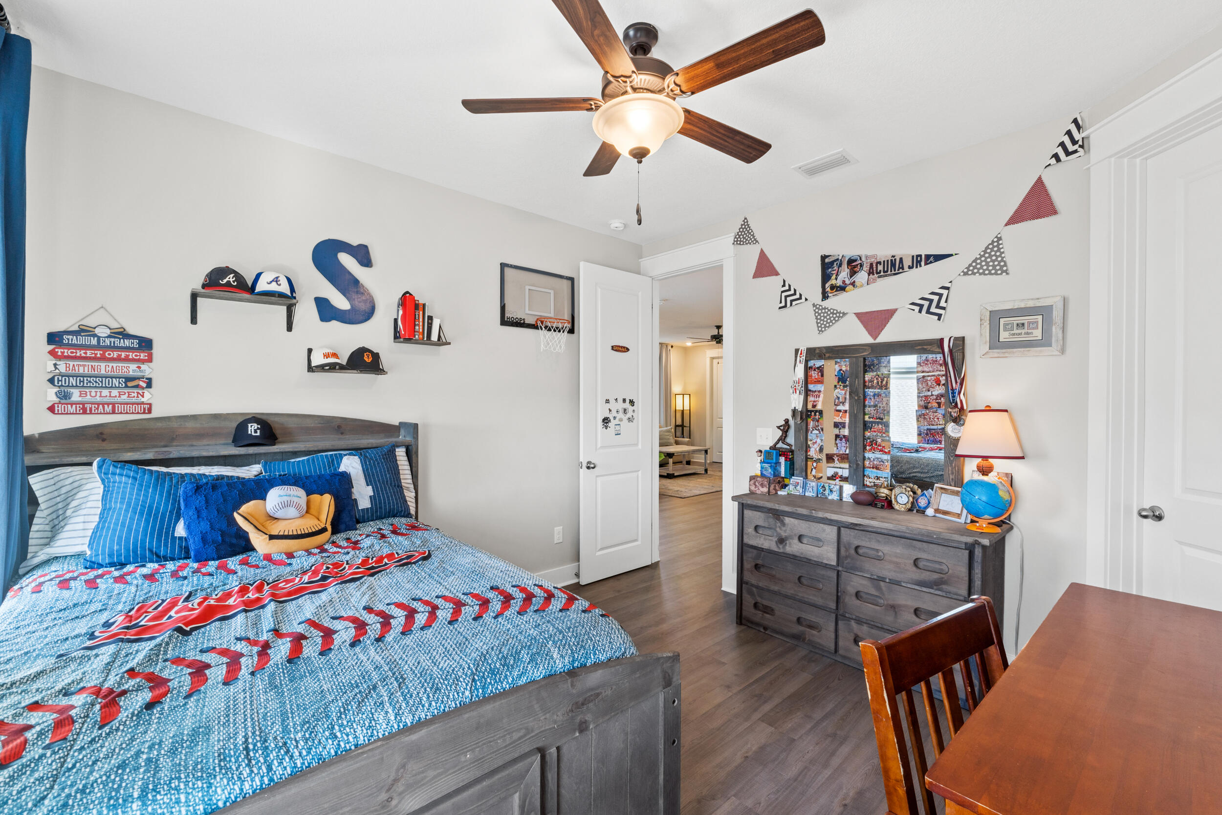 1313 North Discovery Loop Panama City, FL 32405 - Photo 27 of 50 a bedroom with a bed and furniture