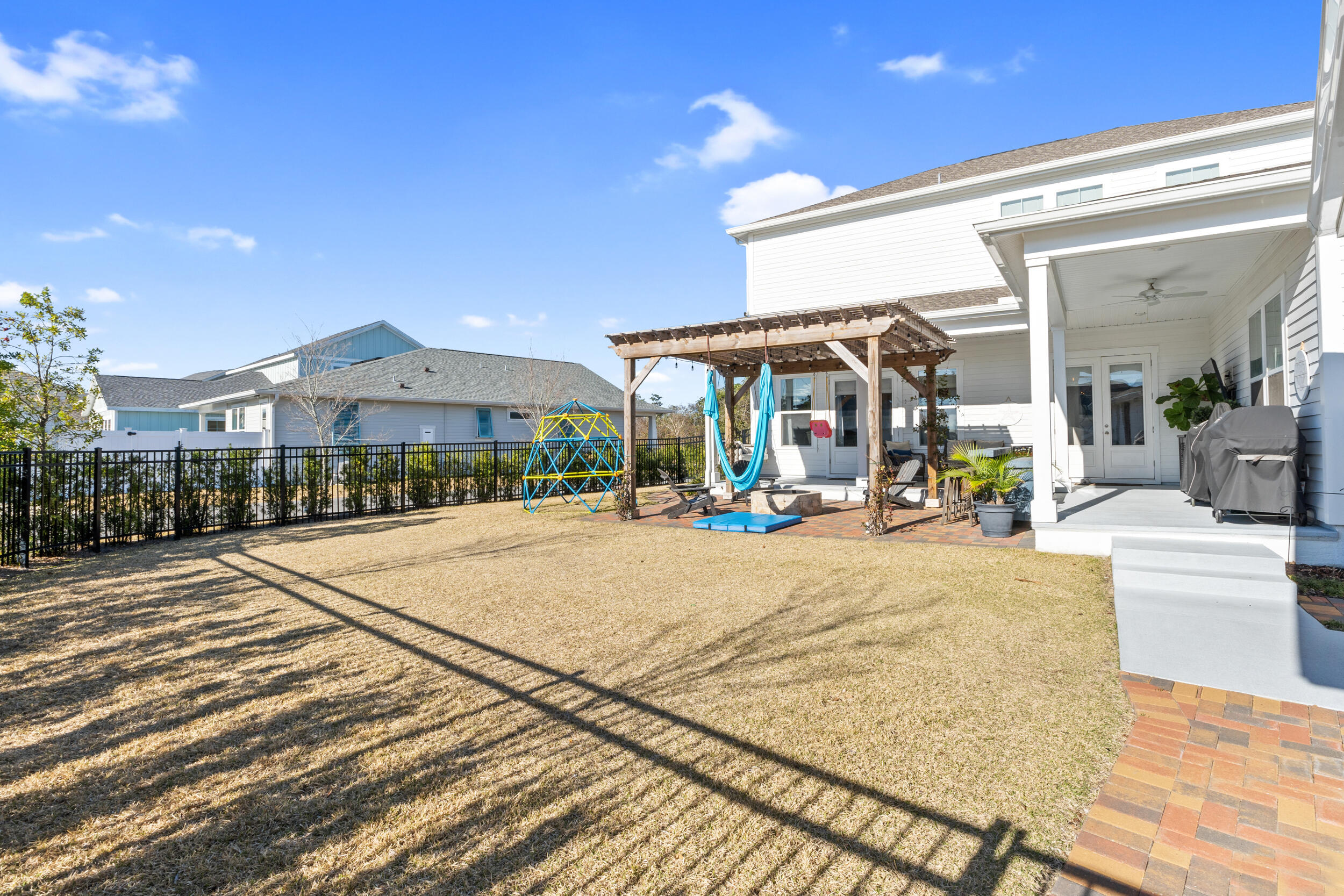 1313 North Discovery Loop Panama City, FL 32405 - Photo 37 of 50 a view of a building with sitting area