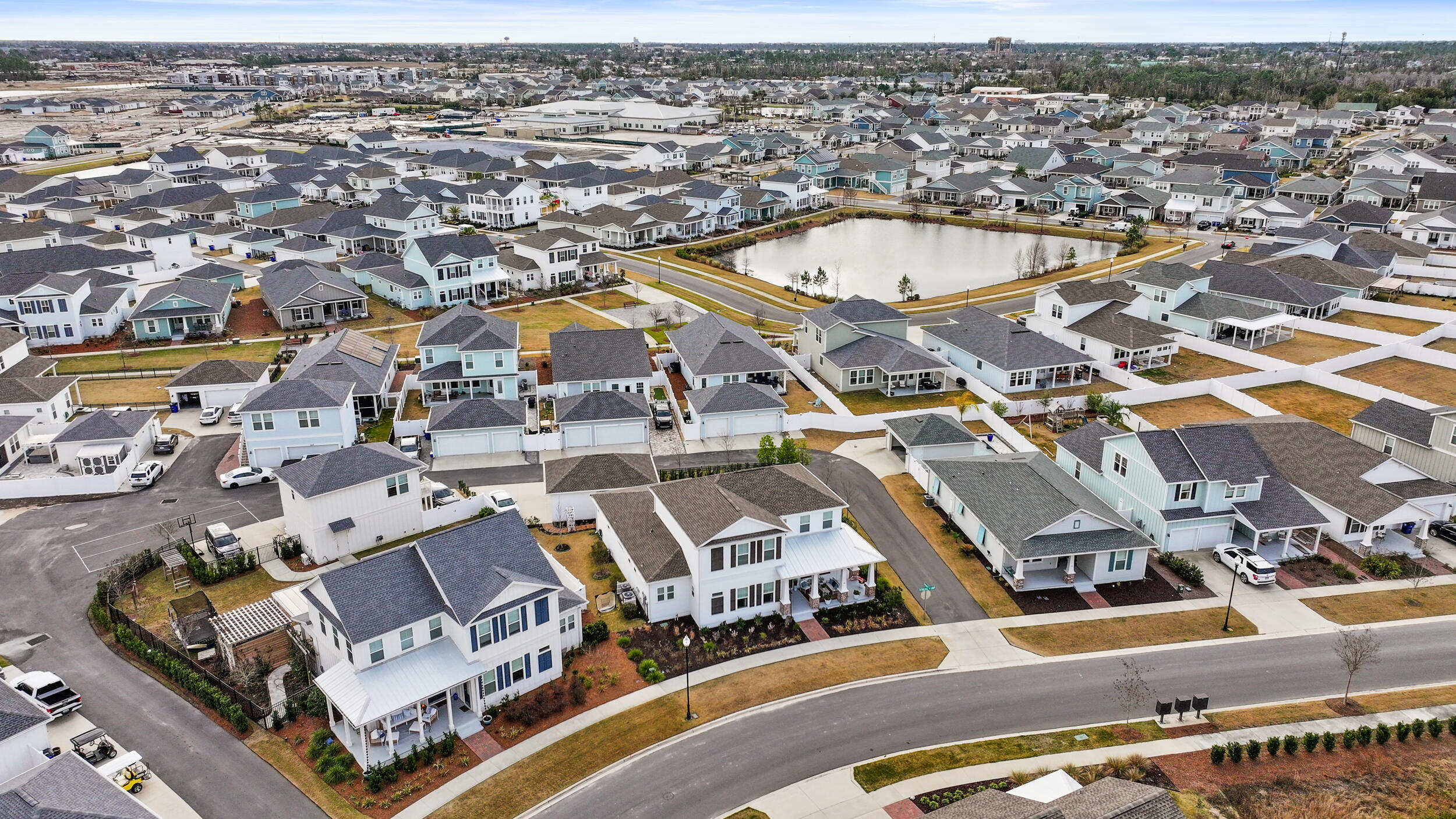 1313 North Discovery Loop Panama City, FL 32405 - Photo 40 of 50 an aerial view of a residential houses with parking space
