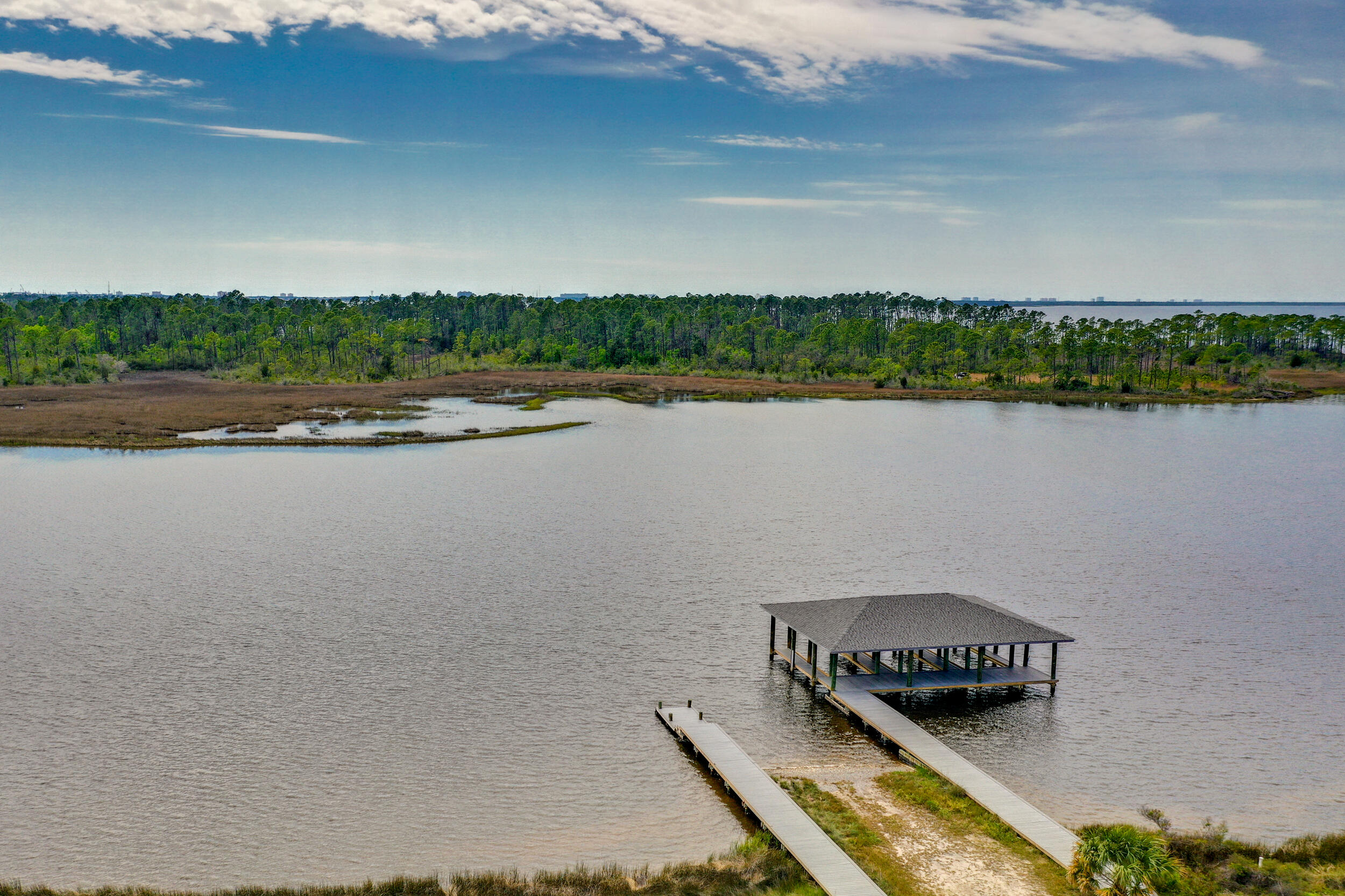 1313 North Discovery Loop Panama City, FL 32405 - Photo 45 of 50 a view of a lake with outdoor space