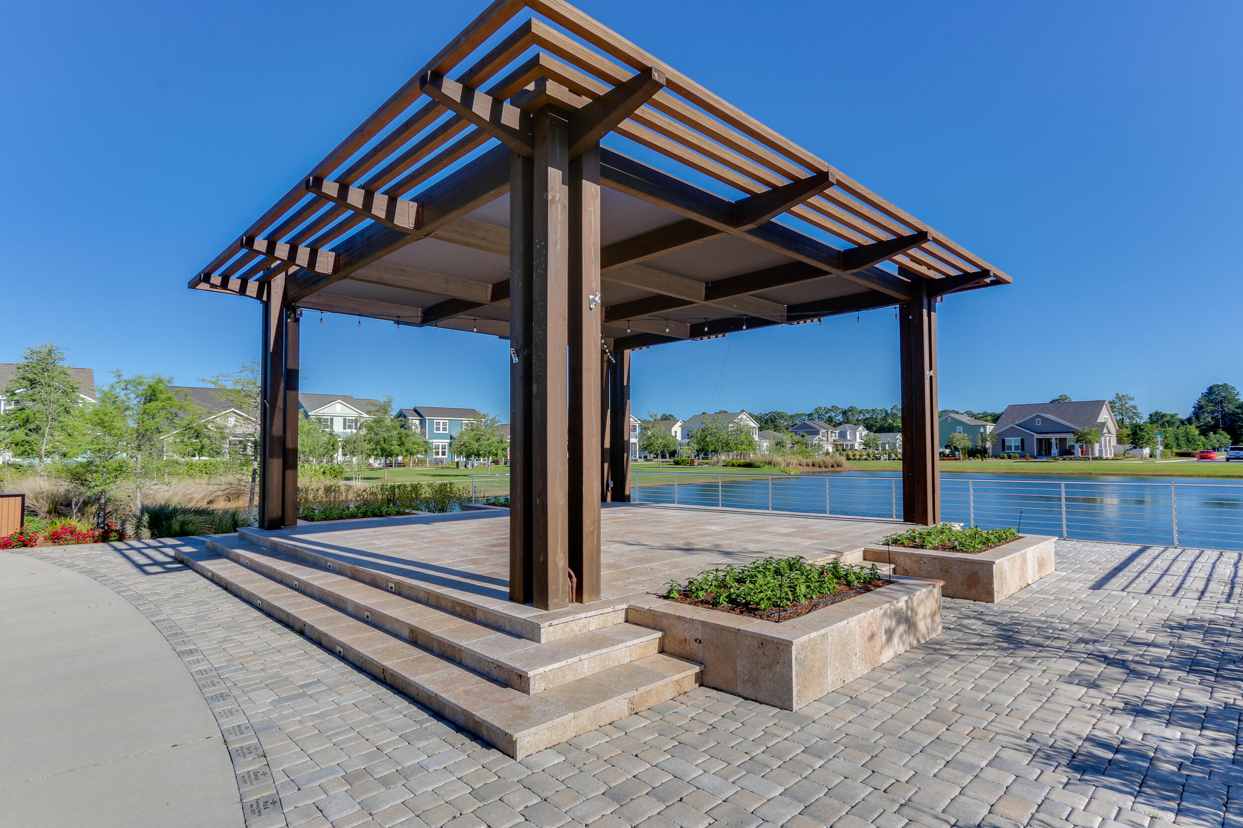 1313 North Discovery Loop Panama City, FL 32405 - Photo 50 of 50 a view of a patio with a table chairs and a table
