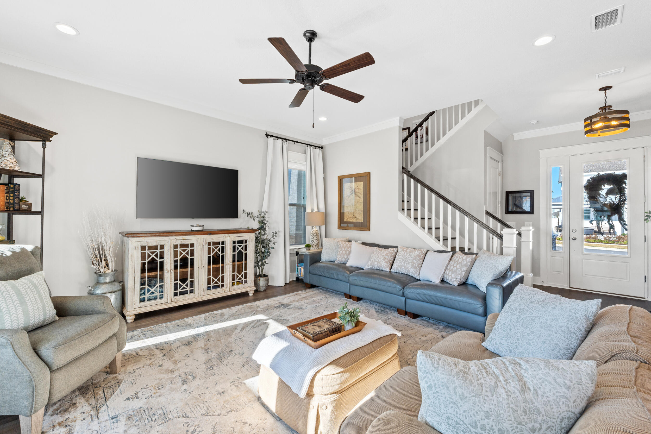 1313 North Discovery Loop Panama City, FL 32405 - Photo 6 of 50 a living room with furniture and a flat screen tv