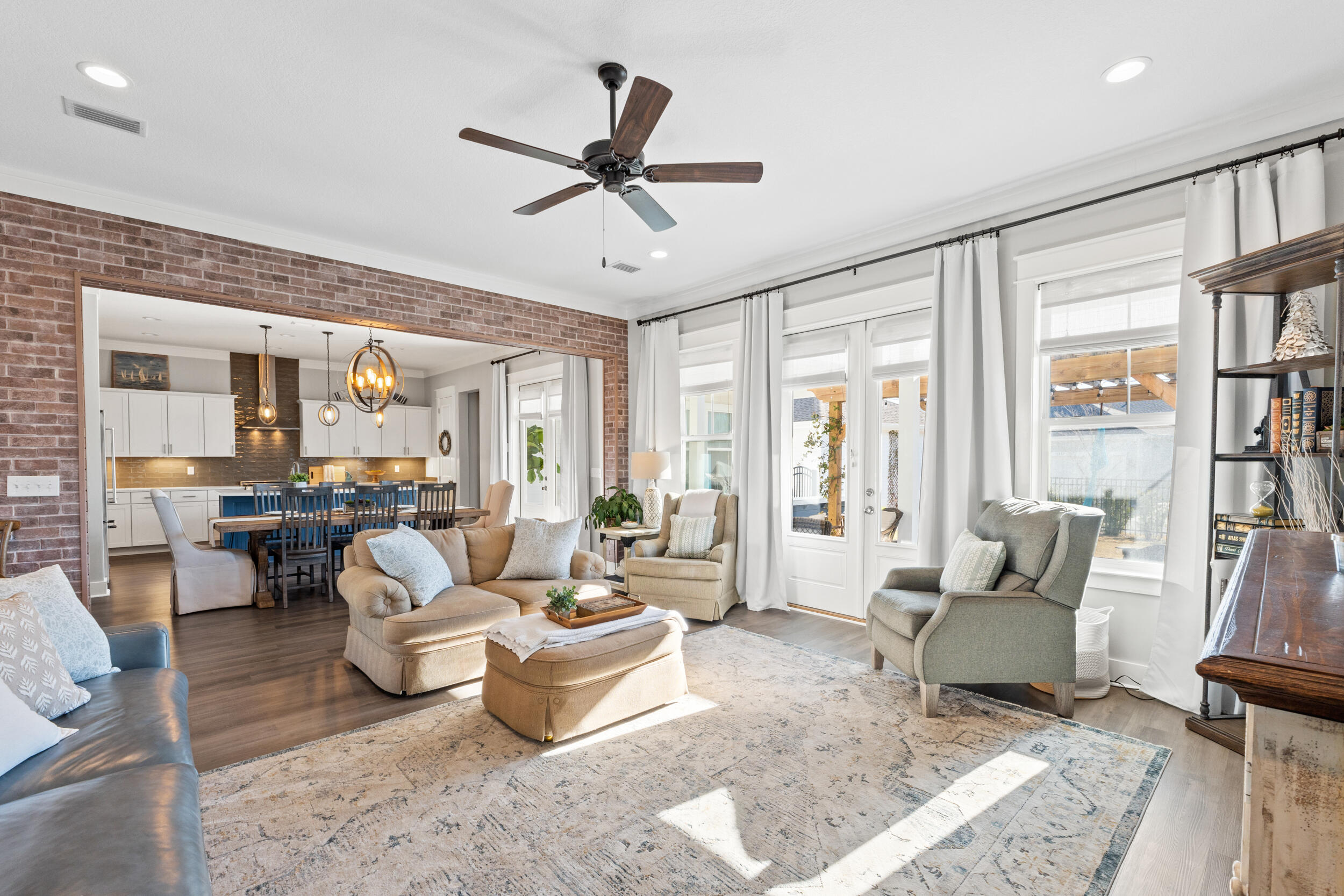 1313 North Discovery Loop Panama City, FL 32405 - Photo 7 of 50 a living room with furniture and a large window