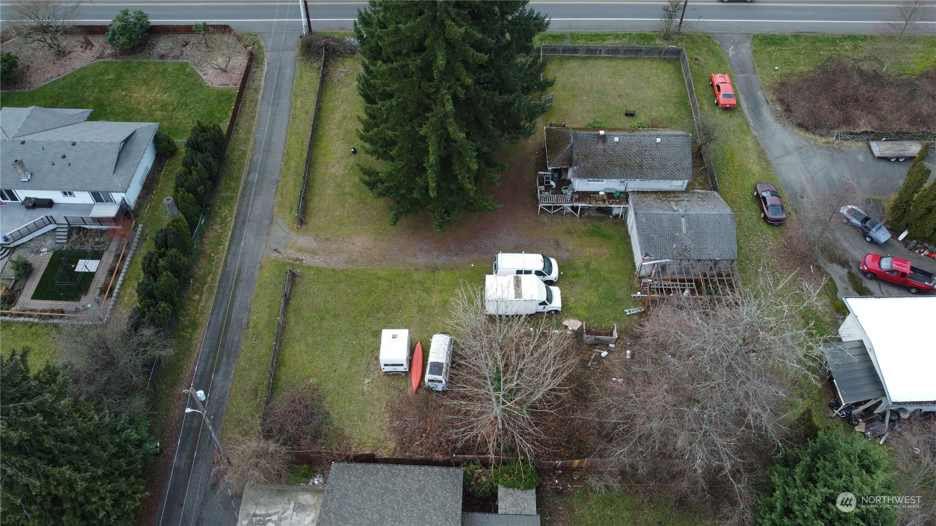 15323 Cascadian Way Bothell, WA 98012 - Photo 3 of 8 an aerial view of residential houses with outdoor space