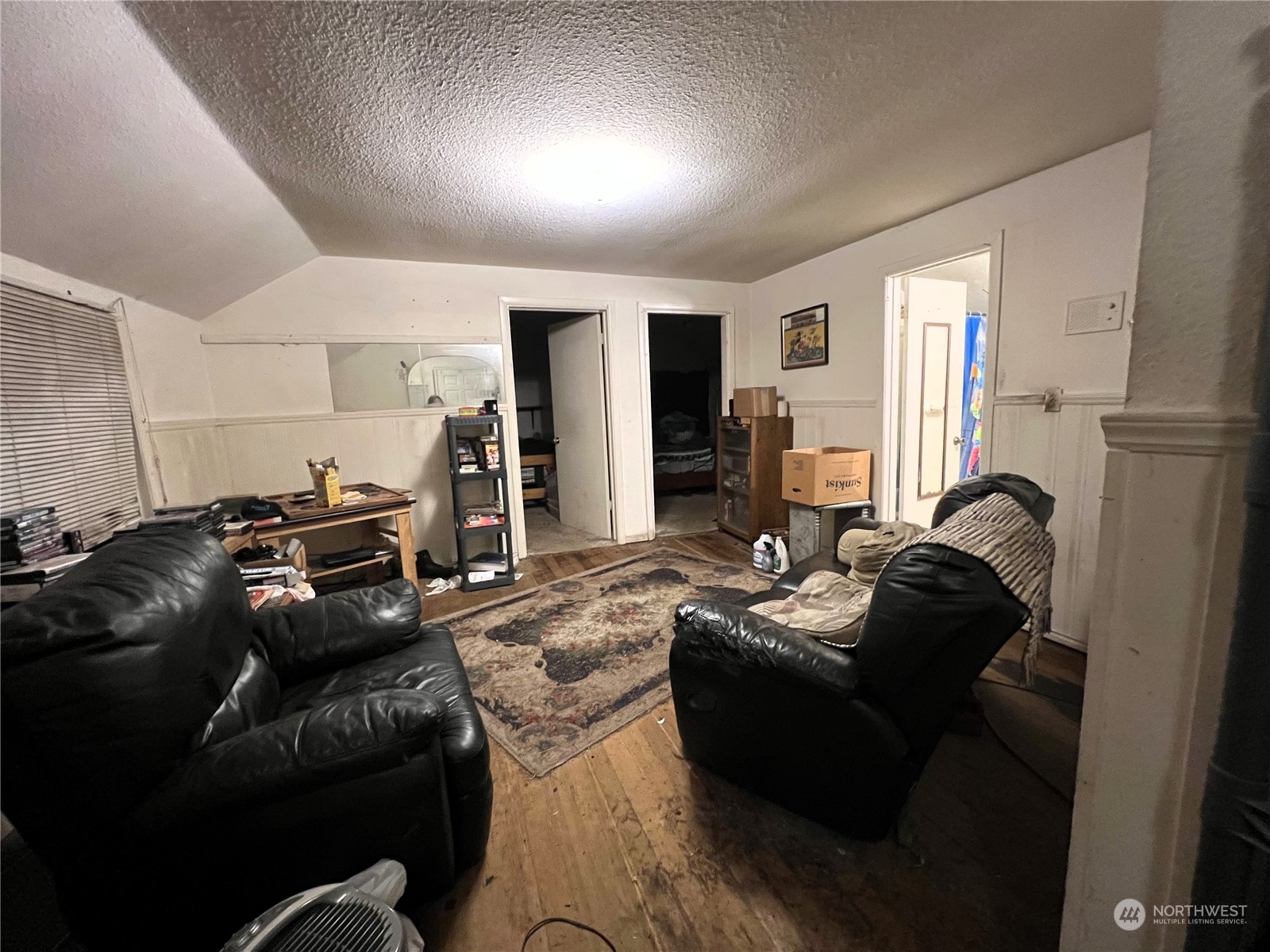 15323 Cascadian Way Bothell, WA 98012 - Photo 5 of 8 a living room with furniture and a window