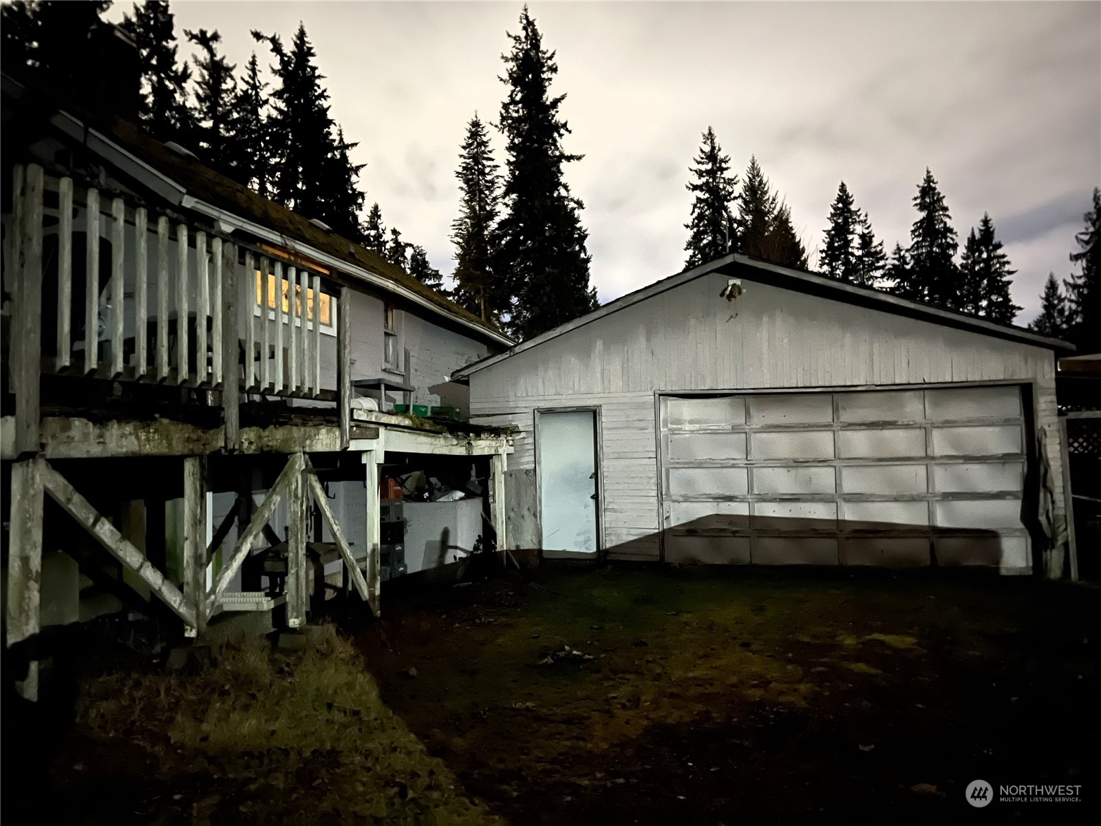 15323 Cascadian Way Bothell, WA 98012 - Photo 8 of 8 a view of a white house with a yard next to a road