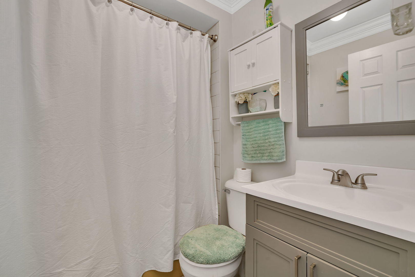 8010 West 84th Street Justice, IL 60458 - Photo 11 of 32 a bathroom with a sink toilet and shower