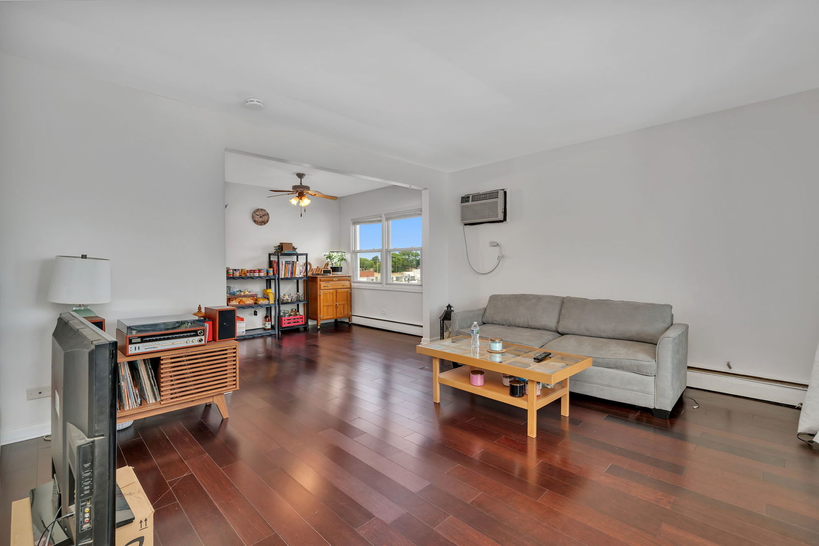 8010 West 84th Street Justice, IL 60458 - Photo 12 of 32 a living room with furniture and a wooden floor