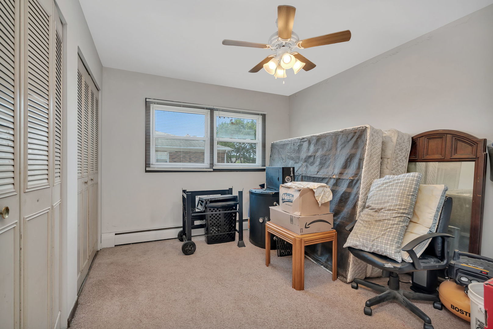8010 West 84th Street Justice, IL 60458 - Photo 26 of 32 a view of a workspace with furniture and a window