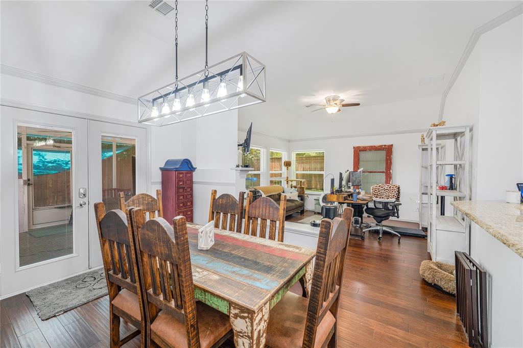 2813 Ridgemere Drive Flower Mound, TX 75028 - Photo 7 of 18 a view of a dining room with furniture window and wooden floor
