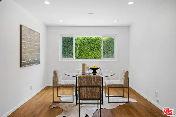 a workspace with furniture and a window