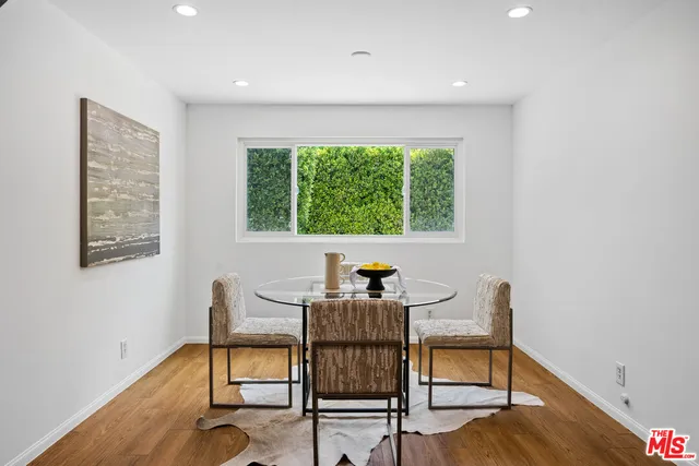 a workspace with furniture and a window