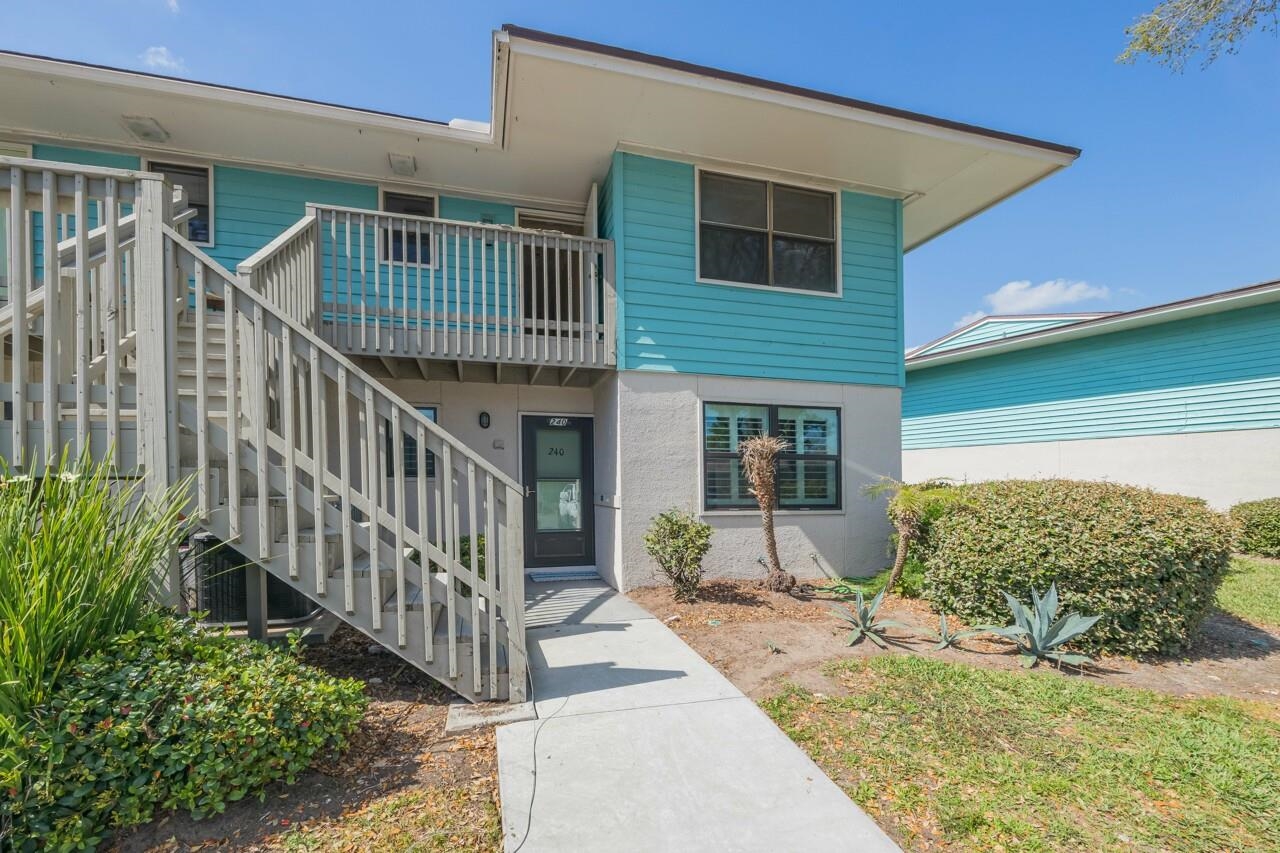 650 West Pope Road, Unit 240 St. Augustine, FL 32080 - Photo 26 of 35 a view of a house with backyard and porch