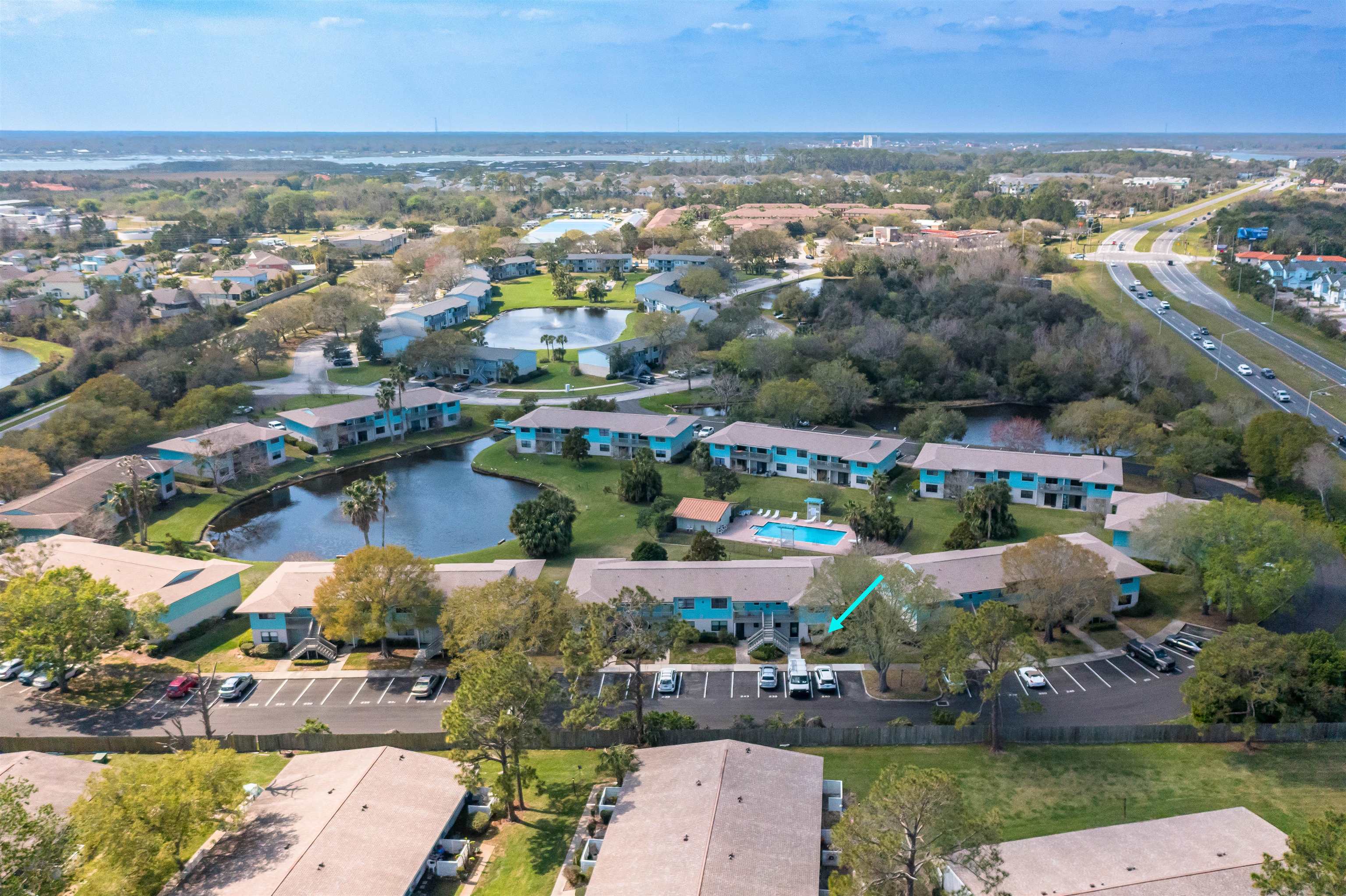 650 West Pope Road, Unit 240 St. Augustine, FL 32080 - Photo 32 of 35 an aerial view of a city with lots of residential buildings ocean and mountain view in back