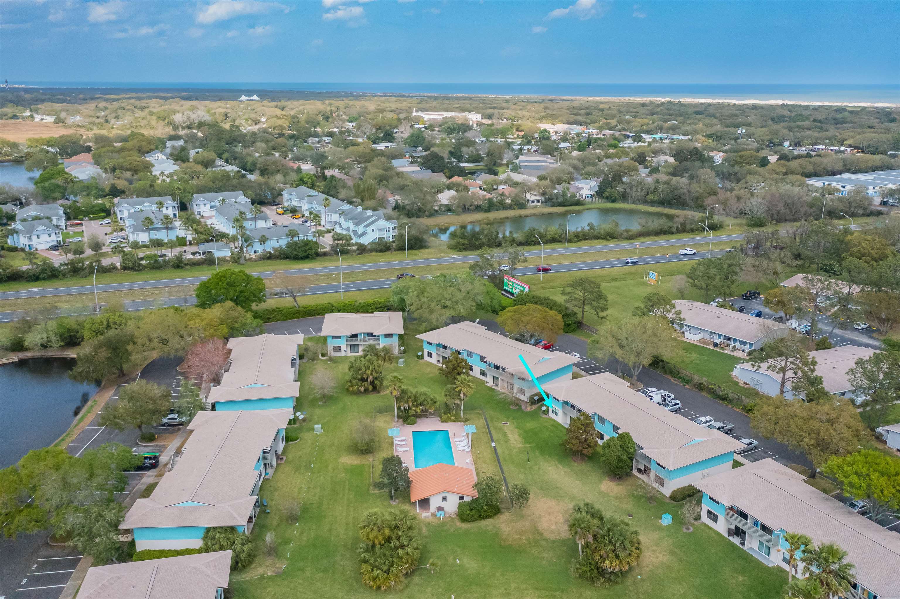 650 West Pope Road, Unit 240 St. Augustine, FL 32080 - Photo 34 of 35 an aerial view of residential houses with outdoor space and river