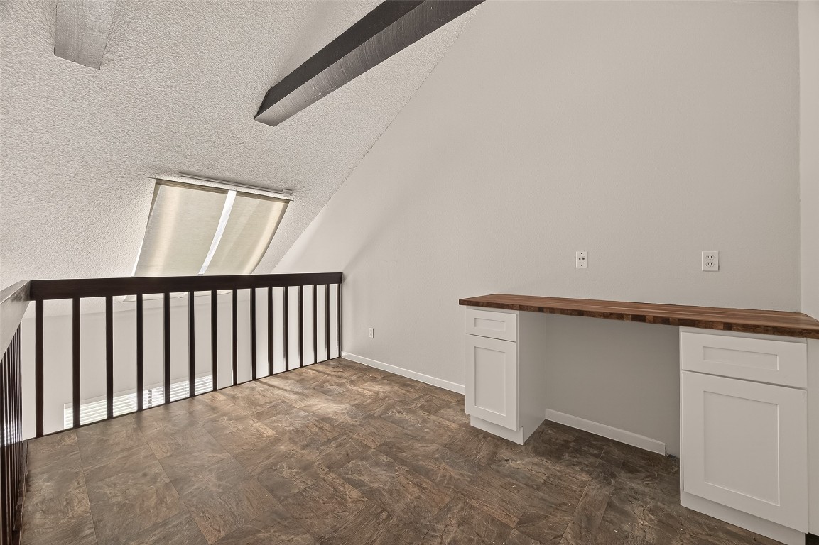 8483 Sands Point Drive Houston, TX 77036 - Photo 17 of 23 a view of an empty room