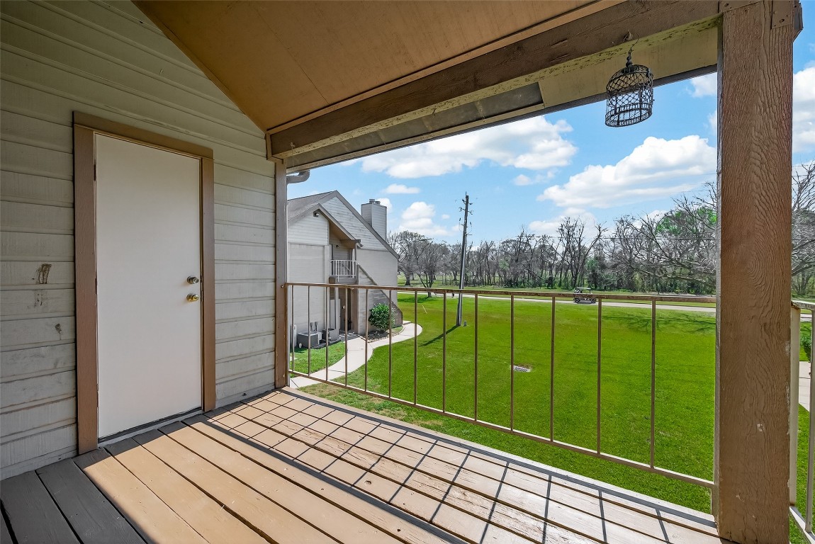 8483 Sands Point Drive Houston, TX 77036 - Photo 20 of 23 a view of a balcony with yard