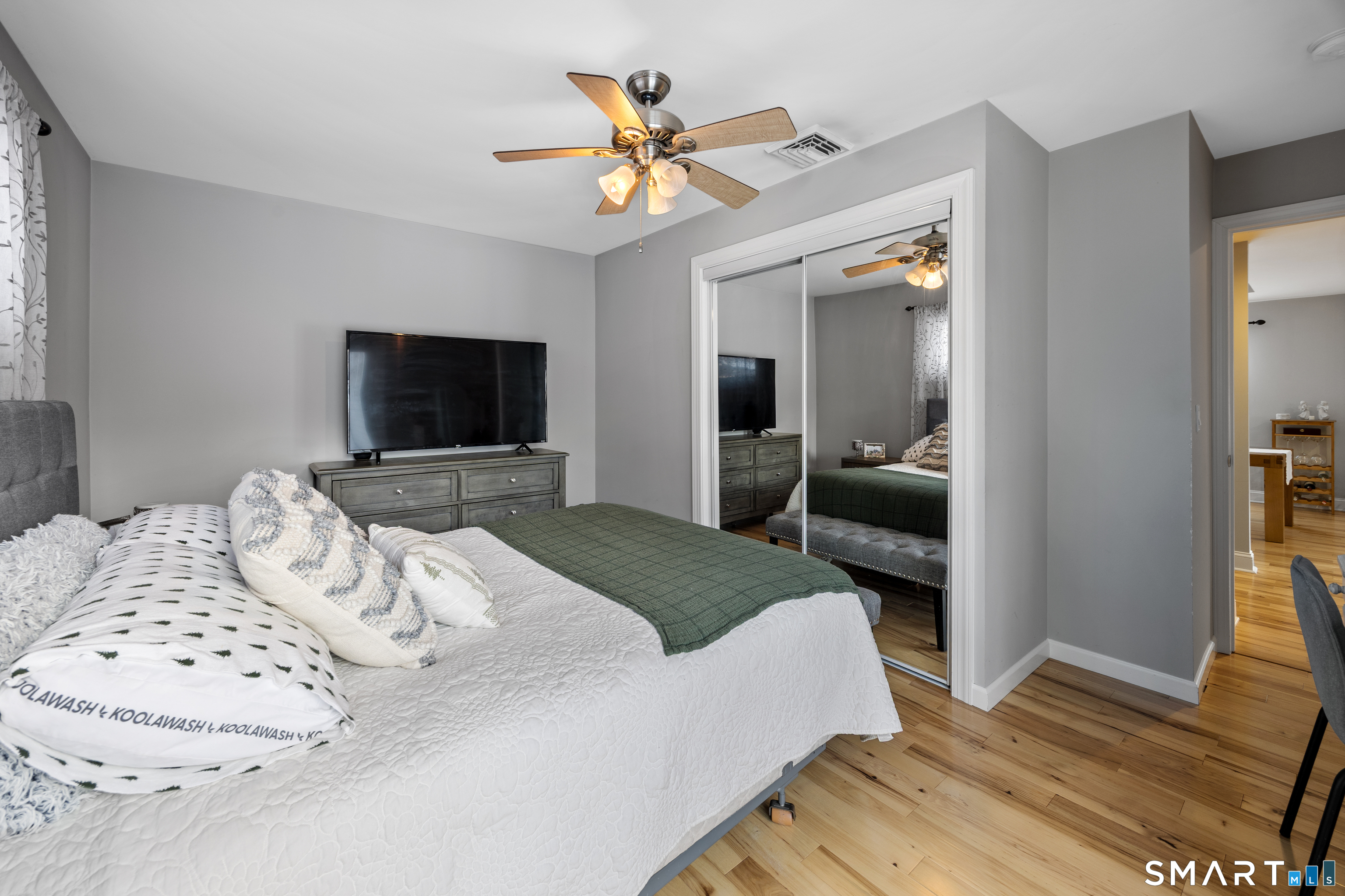 29 Reliance Road Plainville, CT 06062 - Photo 14 of 25 a bedroom with a bed and a flat screen tv