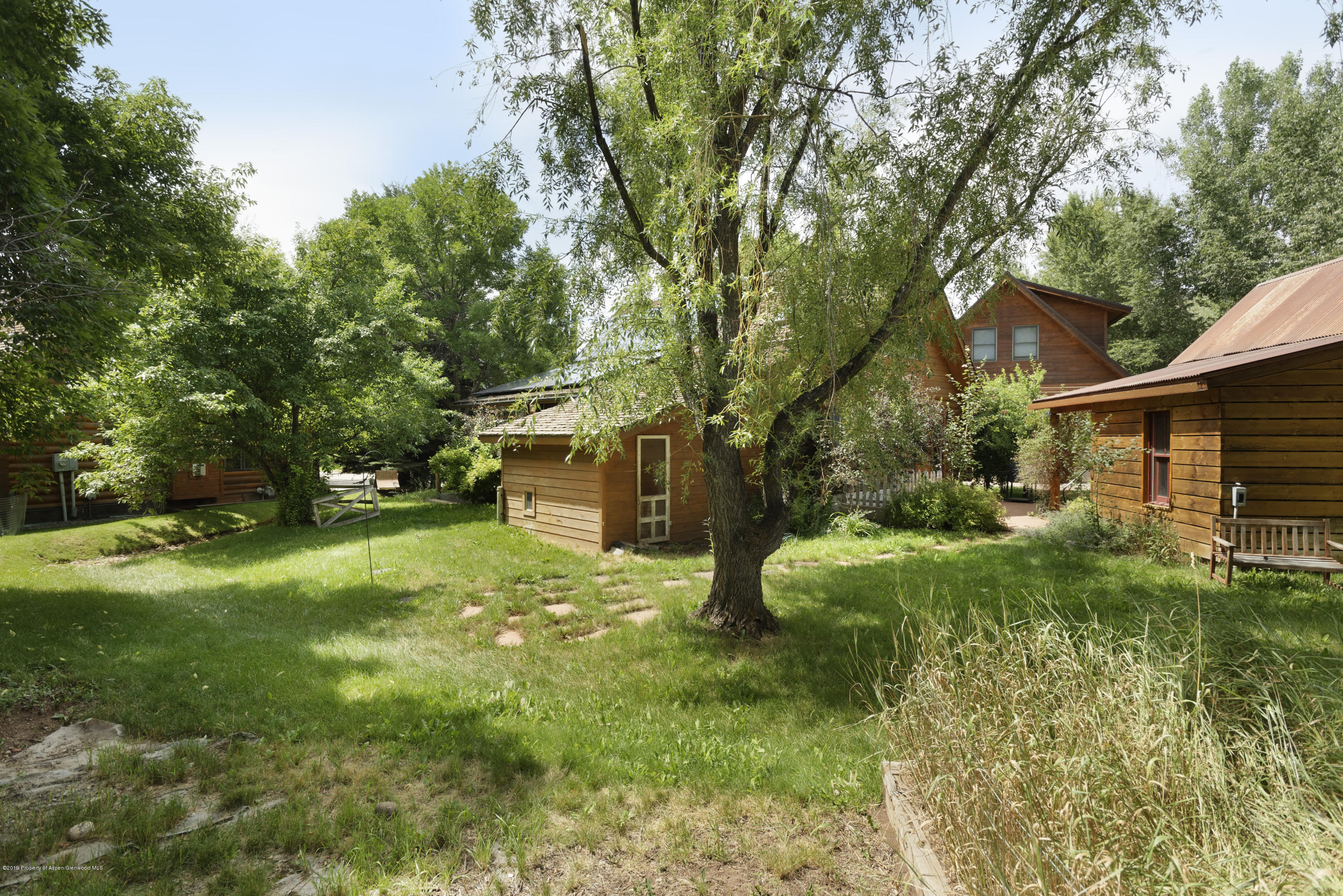 175 Village Court Basalt, CO 81621 - Photo 23 of 25 a view of a tree in front of a house