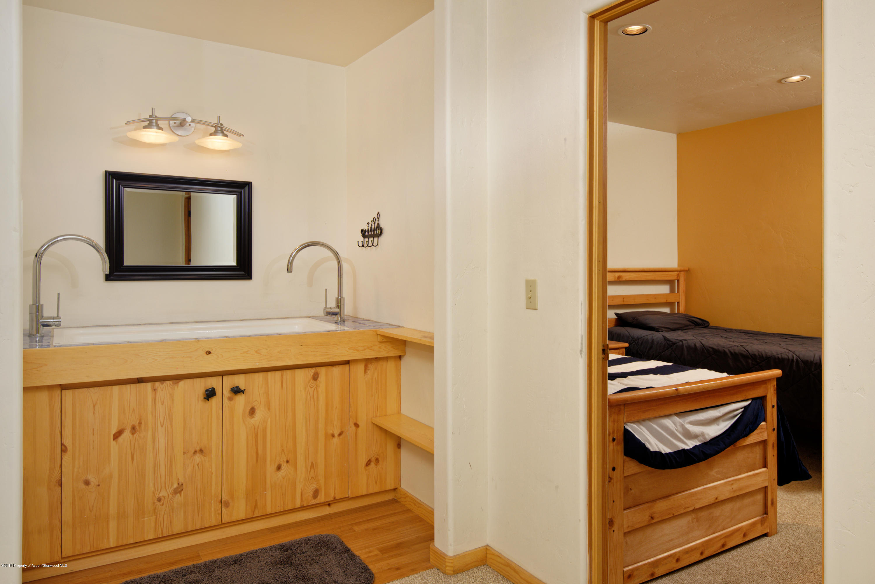 175 Village Court Basalt, CO 81621 - Photo 10 of 25 a bathroom with a sink and a mirror