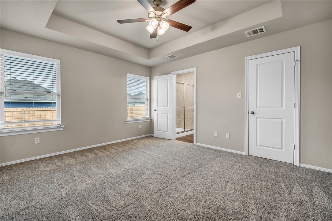 1236 High Street Navasota, TX 77868 - Photo 8 of 14 a view of an empty room with a window